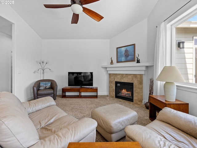 37149 Emerald Cascade, Sandy, OR 97055 - carpeted living area featuring a ceiling fan, a tiled fireplace, and lofted ceiling