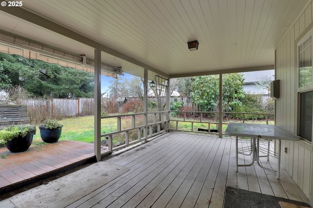 wooden deck featuring fence