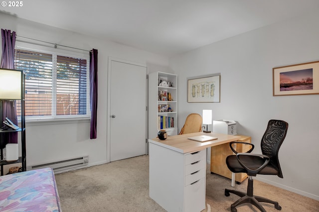 home office with a baseboard radiator, light colored carpet, and baseboards