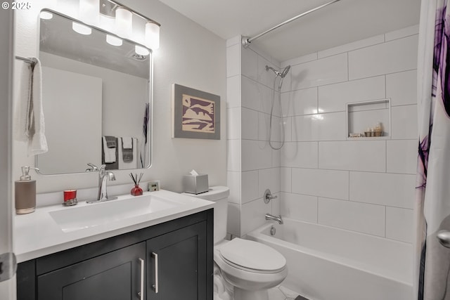 full bathroom with toilet, shower / tub combo, and vanity