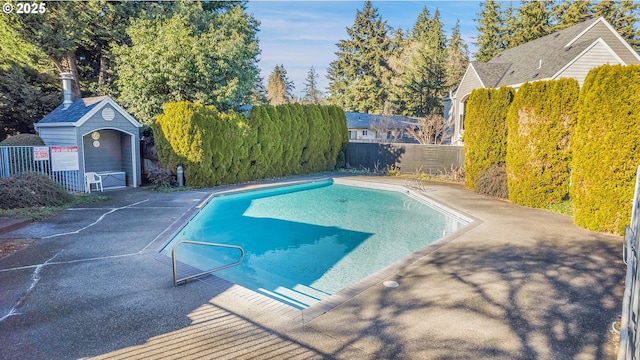 view of pool featuring a fenced backyard and a patio area