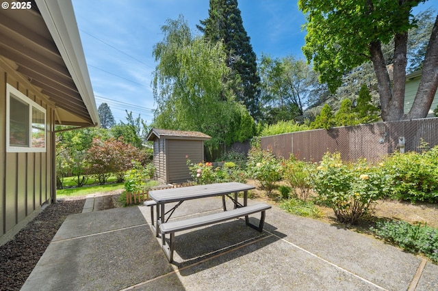 13440 SW Greenleaf Pl, Beaverton, OR 97005 - fenced backyard featuring a patio and outdoor dining area