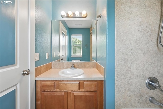 full bath featuring vanity