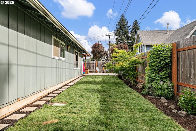view of yard featuring a fenced backyard
