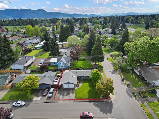 bird's eye view with a residential view and a mountain view