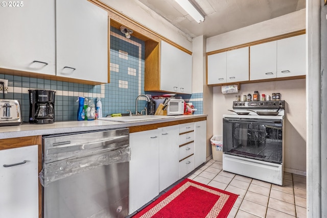 kitchen with light tile patterned floors, electric range, decorative backsplash, white cabinets, and dishwasher