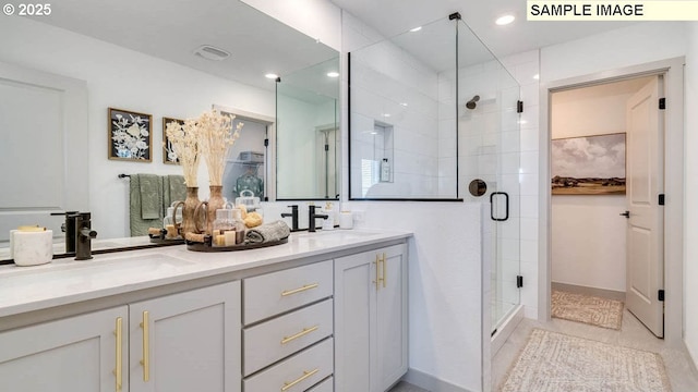 1518 W 14th Ave, La Center, WA 98629 - bathroom with a shower stall, double vanity, recessed lighting, and tile patterned flooring