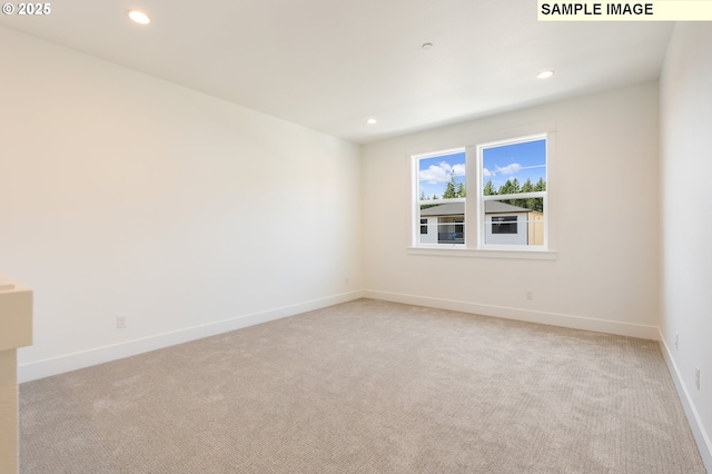 view of carpeted spare room