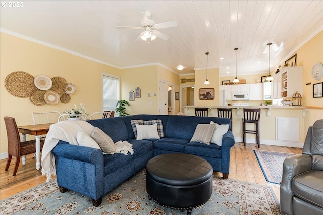 1537 NW 21st St, Lincoln City, OR 97367 - living area featuring light wood-type flooring, crown molding, a ceiling fan, recessed lighting, and baseboards