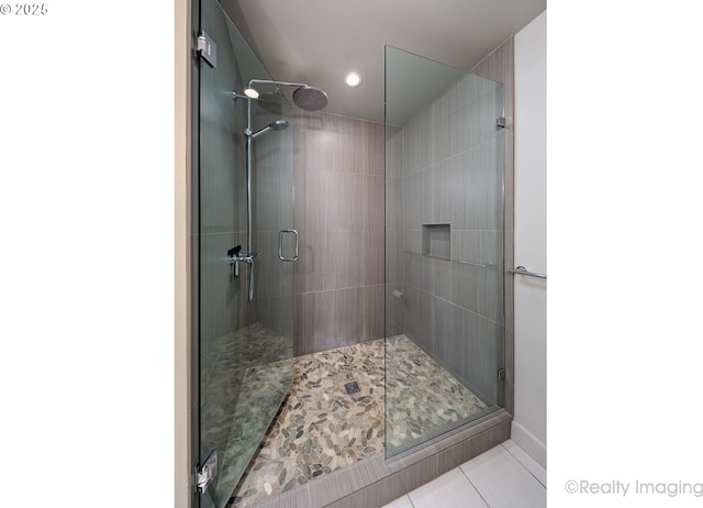 949 NW Overton St Unit 1302, Portland, OR 97209 - full bath with tile patterned flooring, a shower stall, and recessed lighting