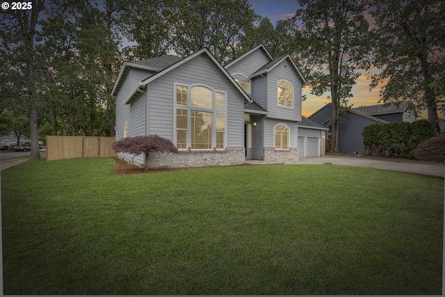 1974 SE 60th Ave, Hillsboro, OR 97123 - traditional-style home with concrete driveway, a garage, roof with shingles, and brick siding