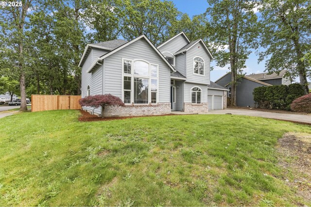 1974 SE 60th Ave, Hillsboro, OR 97123 - traditional-style house with concrete driveway, brick siding, an attached garage, and a shingled roof