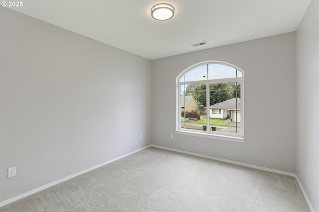 1974 SE 60th Ave, Hillsboro, OR 97123 - empty room with light colored carpet and baseboards