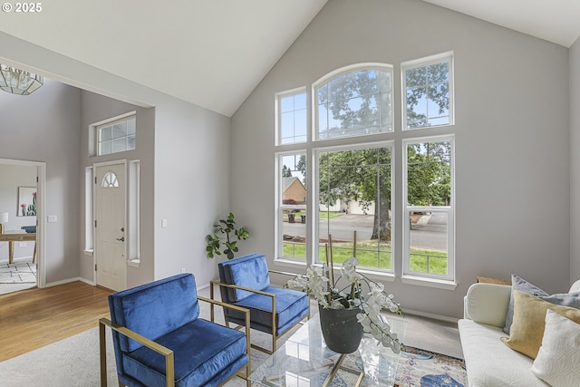 1974 SE 60th Ave, Hillsboro, OR 97123 - living room with high vaulted ceiling, wood finished floors, and baseboards