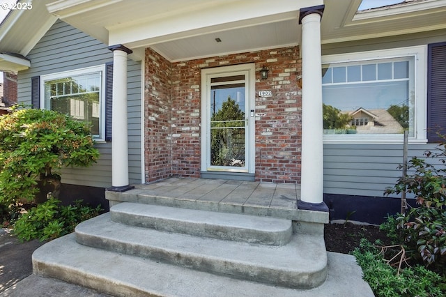 1902 N Terry St, Portland, OR 97217 - entrance to property with covered porch and brick siding