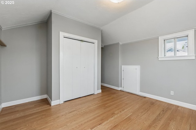 1902 N Terry St, Portland, OR 97217 - bonus room featuring light wood-style flooring, baseboards, and vaulted ceiling