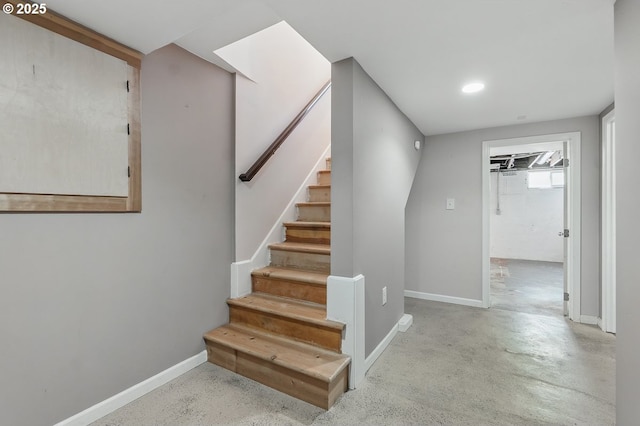 1902 N Terry St, Portland, OR 97217 - staircase with baseboards, concrete floors, and recessed lighting