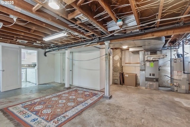 1902 N Terry St, Portland, OR 97217 - unfinished basement featuring strapped water heater, washer and dryer, and heating unit