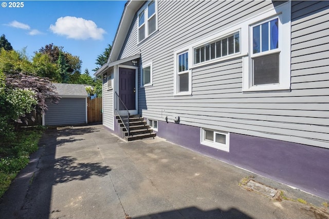1902 N Terry St, Portland, OR 97217 - view of side of home featuring entry steps