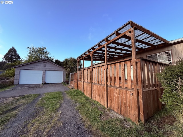 view of yard with an outbuilding and a detached garage