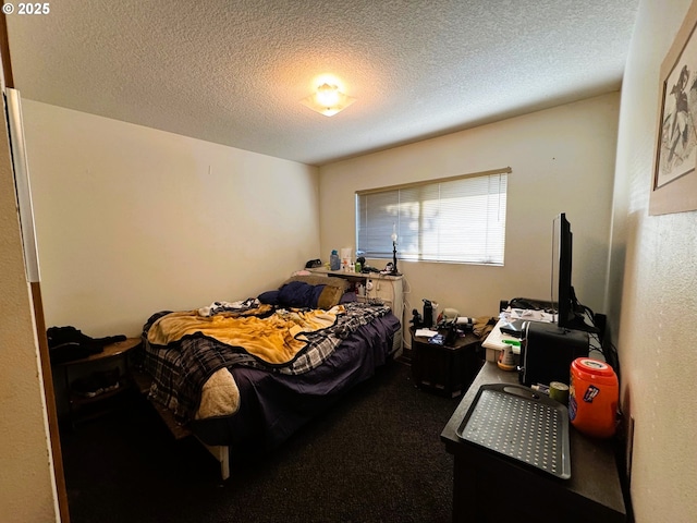 carpeted bedroom with a textured ceiling