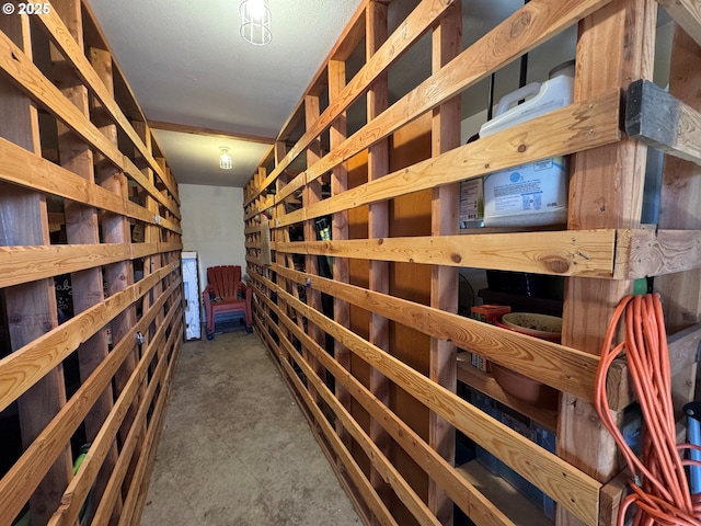 wine room featuring concrete floors