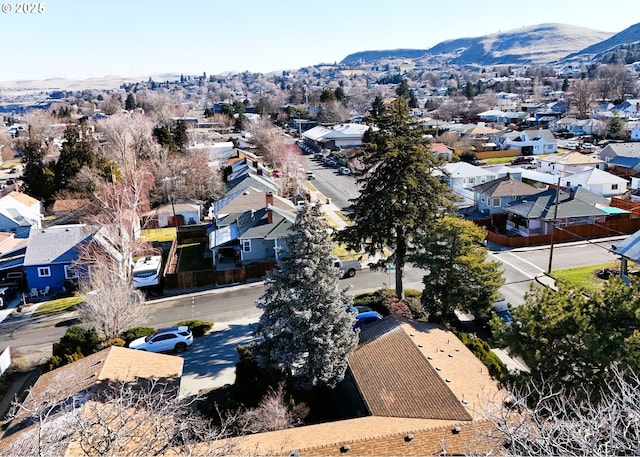 bird's eye view featuring a residential view and a mountain view