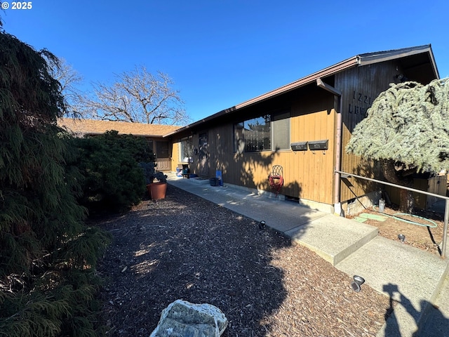 view of home's exterior featuring a patio area