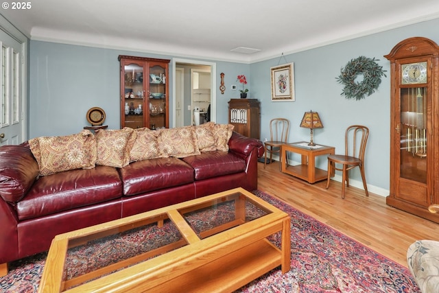 28805 Royal Ave, Eugene, OR 97402 - living area featuring wood finished floors, crown molding, and baseboards