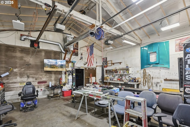 28805 Royal Ave, Eugene, OR 97402 - garage with a workshop area and a garage door opener