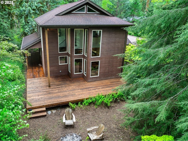 24982 E Tillicum St, Welches, OR 97067 - exterior space with a shingled roof and a wooden deck