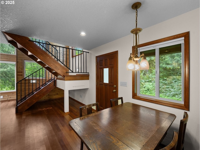 24982 E Tillicum St, Welches, OR 97067 - dining space featuring stairway, wood finished floors, recessed lighting, a textured ceiling, and baseboards
