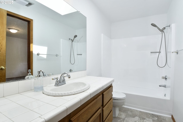 full bathroom with toilet, tub / shower combination, and vanity