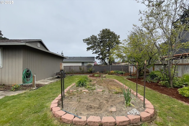 view of yard with a fenced backyard