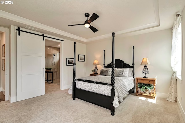 4905 NE 132nd Cir, Vancouver, WA 98686 - carpeted bedroom featuring a barn door, baseboards, and a ceiling fan