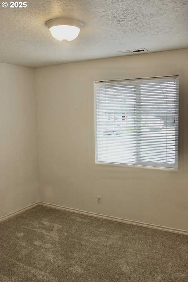 203 Robin Ct, Creswell, OR 97426 - carpeted spare room with a textured ceiling and baseboards