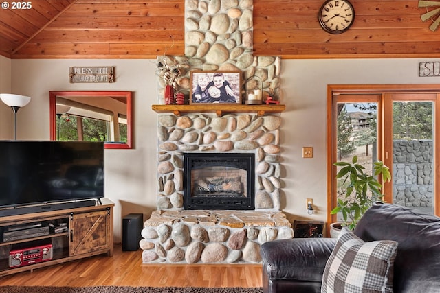 18122 Hulden Ln, Arlington, OR 97812 - living room with wood ceiling, plenty of natural light, a fireplace, wood finished floors, and vaulted ceiling