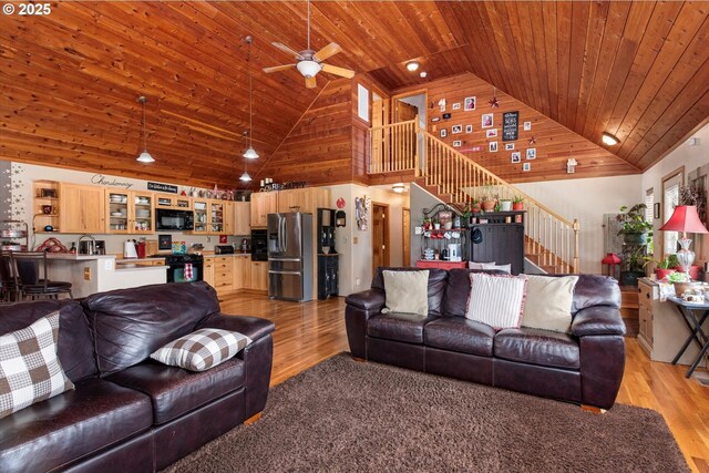 18122 Hulden Ln, Arlington, OR 97812 - living room with wooden ceiling, stairway, light wood-type flooring, high vaulted ceiling, and a ceiling fan