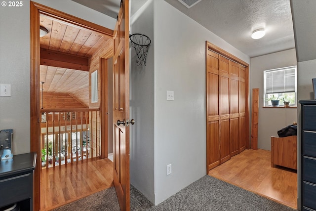 18122 Hulden Ln, Arlington, OR 97812 - corridor with light wood finished floors and wood ceiling