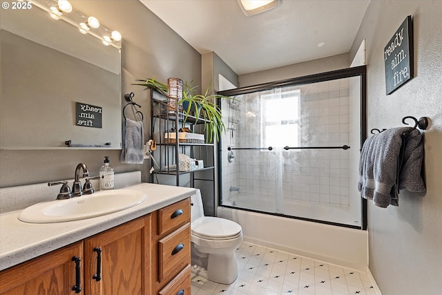 18122 Hulden Ln, Arlington, OR 97812 - bathroom featuring vanity, shower / bath combination with glass door, and tile patterned floors