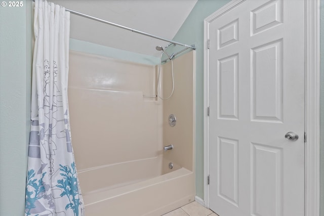 bathroom featuring tile patterned floors and shower / tub combo