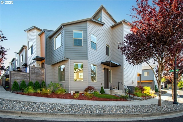 view of front of home featuring central air condition unit