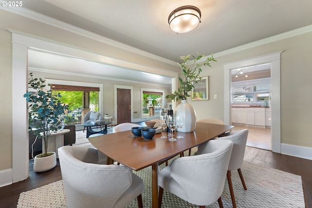 2804 NE 61st Ave, Portland, OR 97213 - dining area featuring plenty of natural light, crown molding, wood finished floors, and baseboards