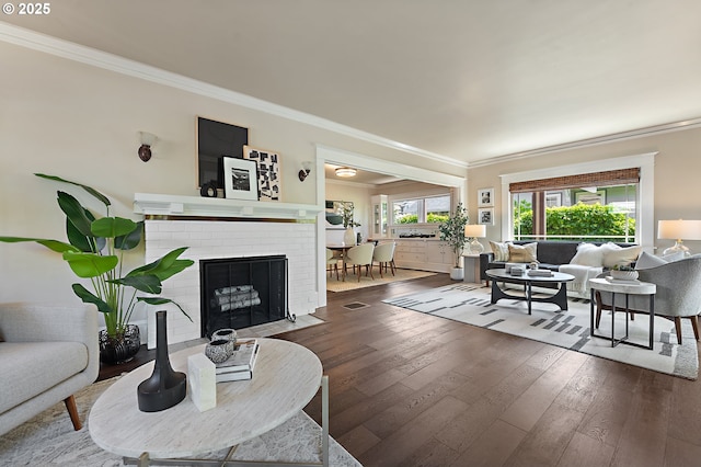 2804 NE 61st Ave, Portland, OR 97213 - living area featuring ornamental molding, hardwood / wood-style flooring, and a brick fireplace