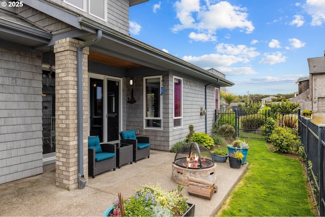 8866 Ocean Crest Ln, Manzanita, OR 97130 - fenced backyard with a fire pit and a patio area