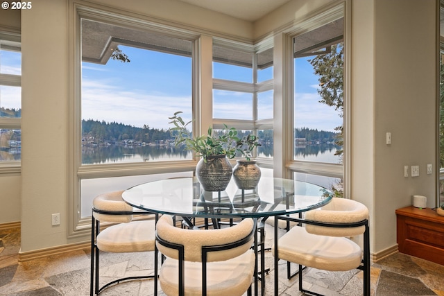 dining area with a water view