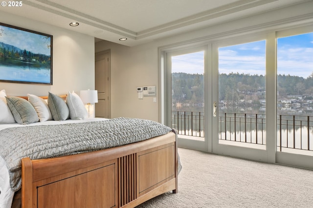 bedroom featuring access to outside and carpet flooring