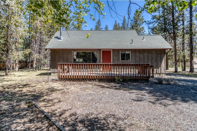 56095 Black Duck Rd, Bend, OR 97707 - view of front of house with a deck and a shingled roof