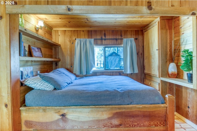 56095 Black Duck Rd, Bend, OR 97707 - bedroom featuring wooden walls and wood ceiling