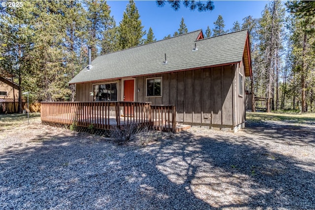 56095 Black Duck Rd, Bend, OR 97707 - back of property with roof with shingles and a wooden deck